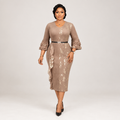 Black Nigerian model wearing a taupe floral midi gown with ruffle sleeves and a belted waist