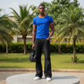 Nigerian male model full body wearing men's royal blue orange trim ringer crew-neck t-shirt