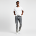 Nigerian model wearing grey washed straight jeans