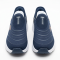 Pair of navy mesh slip-on sneakers with curved overlays and white soles on white