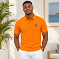 Young Black Nigerian man wearing bright orange nautical club badge polo shirt