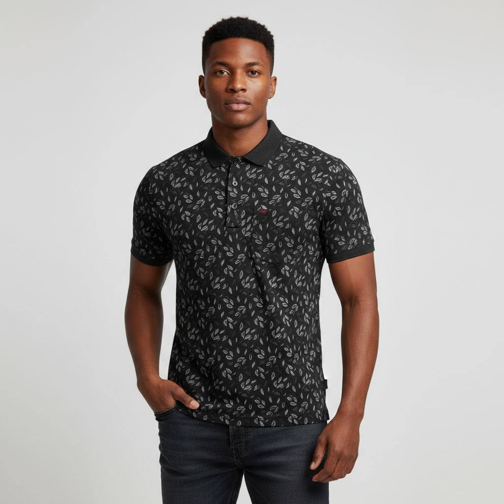 Young Nigerian male model wearing black leaf print polo shirt