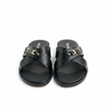 Men's black embossed quilted leather cross-strap slide sandals with gold metal plaque hardware and rivets, black cushioned footbed, ghost mannequin pair view on white background