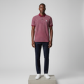 Nigerian male model wearing burgundy striped polo shirt