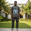 Nigerian male model wearing charcoal street lore urban myths graphic oversized tee – front view