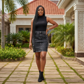 Nigerian female model wearing Women's Charcoal Acid-Wash Denim Mini Skirt with Embroidered Pockets
