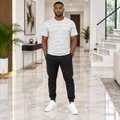 Man wearing light grey tonal speed print tee