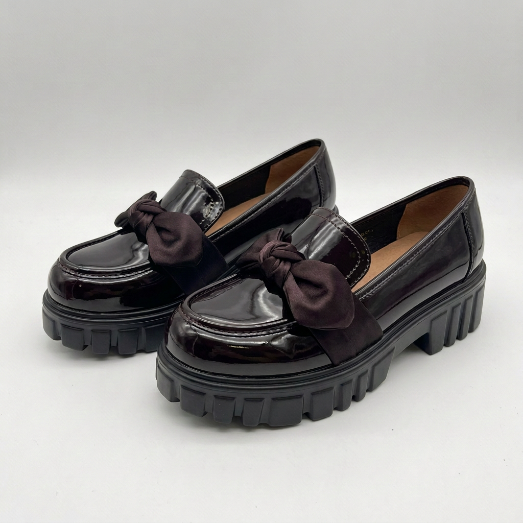 Complete matching pair of dark plum glossy bow chunky-sole loafers