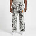 Adult Black model wearing light grey graffiti-print drawstring joggers