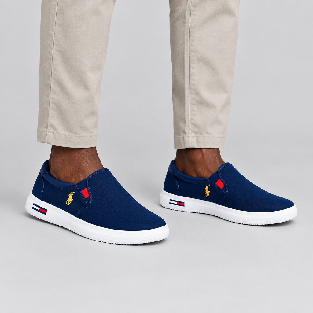 Both navy red-accent slip-on sneakers worn against a plain studio background