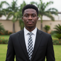 Nigerian male model wearing black and white tartan plaid woven necktie with white shirt and black suit