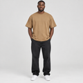 Man wearing plain tan crew-neck T-shirt