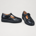 Men's black perforated T-strap shoes with buckle and dark soles