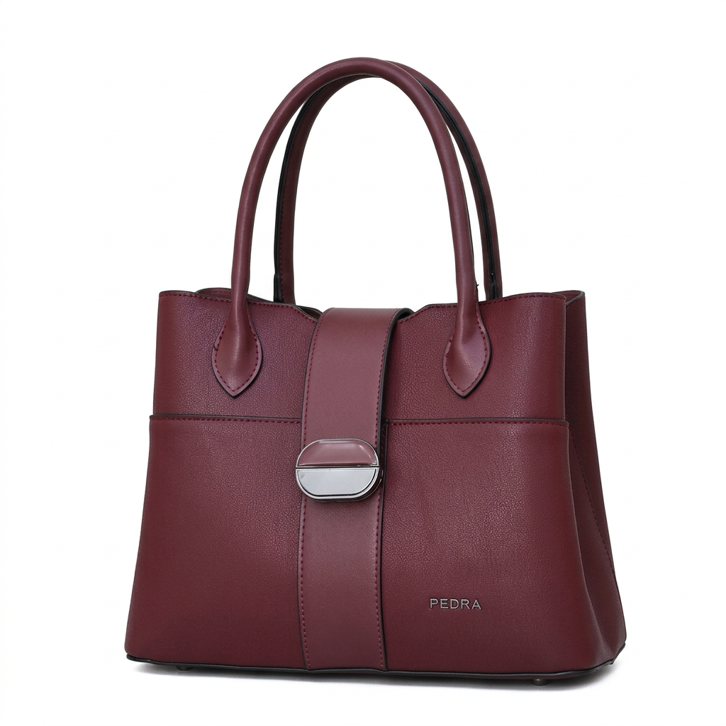 Burgundy twin-handle handbag with central strap and silver-tone oval clasp on white