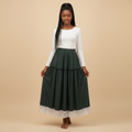 Nigerian girl wearing dark green lace hem tiered midi skirt - front view