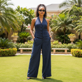 Women's navy blue pinstripe halterneck deep V wide-leg jumpsuit - model shot