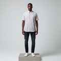 Nigerian male model wearing multicolour plaid short-sleeved shirt