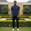Nigerian male model wearing navy blue striped short sleeve polo shirt