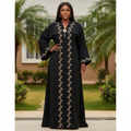 Black abaya with gold vine embroidery on Nigerian female model