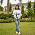 Nigerian female model wearing white Paris sketch graphic tee – front view