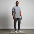 Nigerian male model wearing navy blue pinstripe short-sleeved shirt