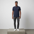 Nigerian male model wearing navy blue polo shirt