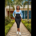 Nigerian female model wearing sky blue and black corset bodycon midi dress