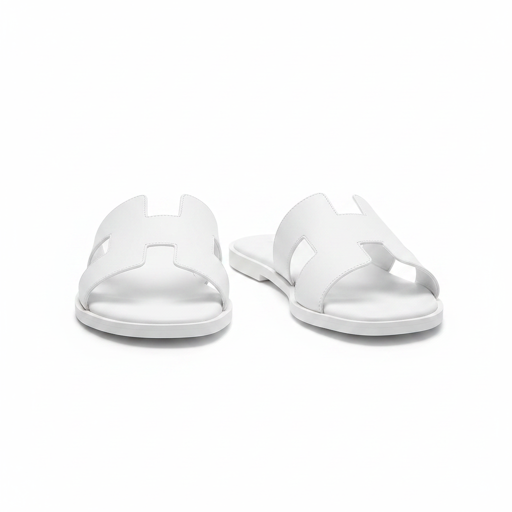 Women's white H-strap flat slide sandal – ghost mannequin pair front and side view