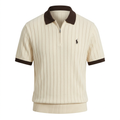 Cream textured zip-neck polo with dark-brown collar and sleeve trim on an invisible mannequin