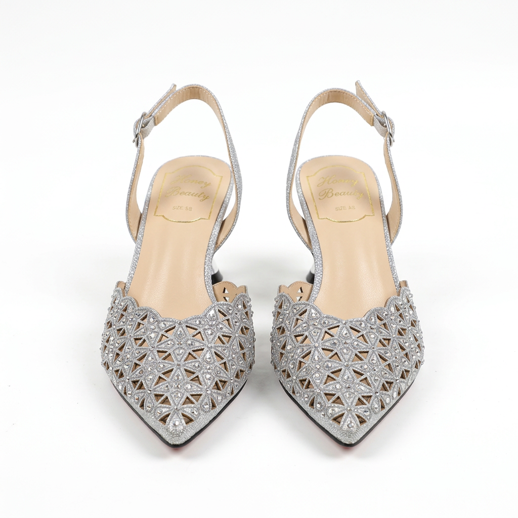 Silver metallic geometric cutout pointed-toe slingback heel pair