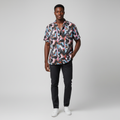 African Nigerian male model wearing men's abstract geometric print short-sleeve vintage shirt