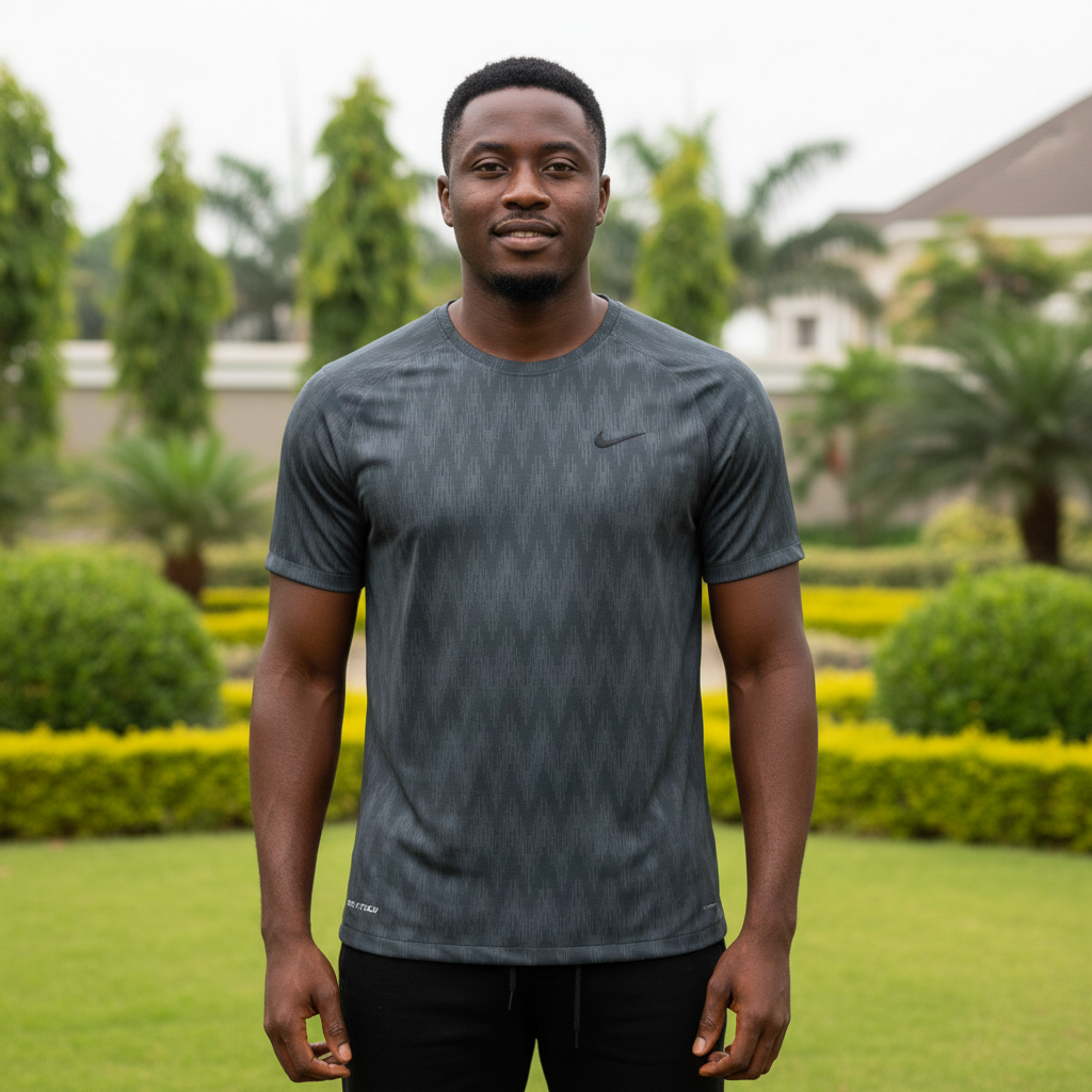 Nigerian male model wearing charcoal geometric sport jersey