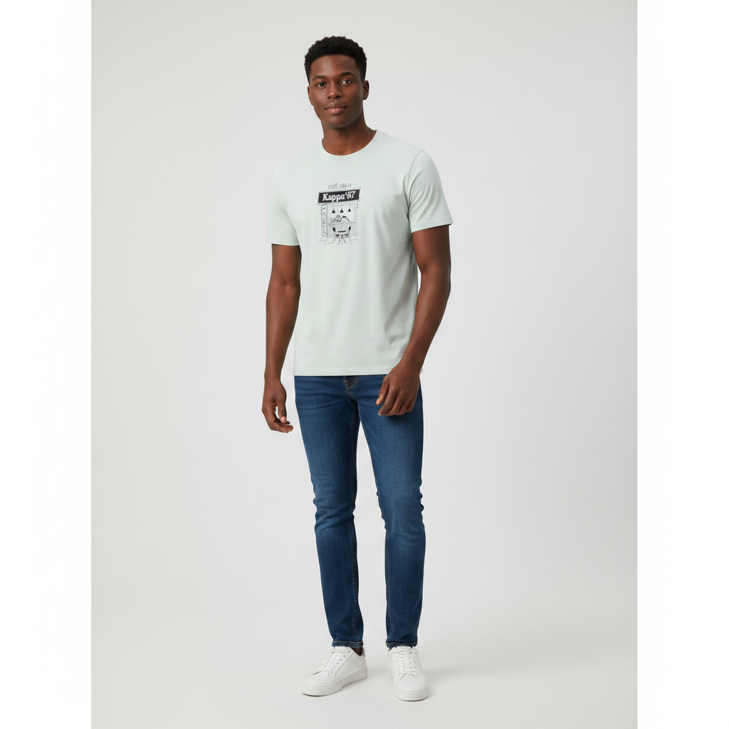 Young Nigerian male wearing sage green Café Italia Kappa 67 graphic crew neck tee