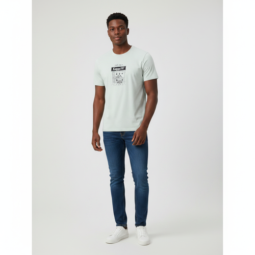 Young Nigerian male wearing sage green Café Italia Kappa 67 graphic crew neck tee