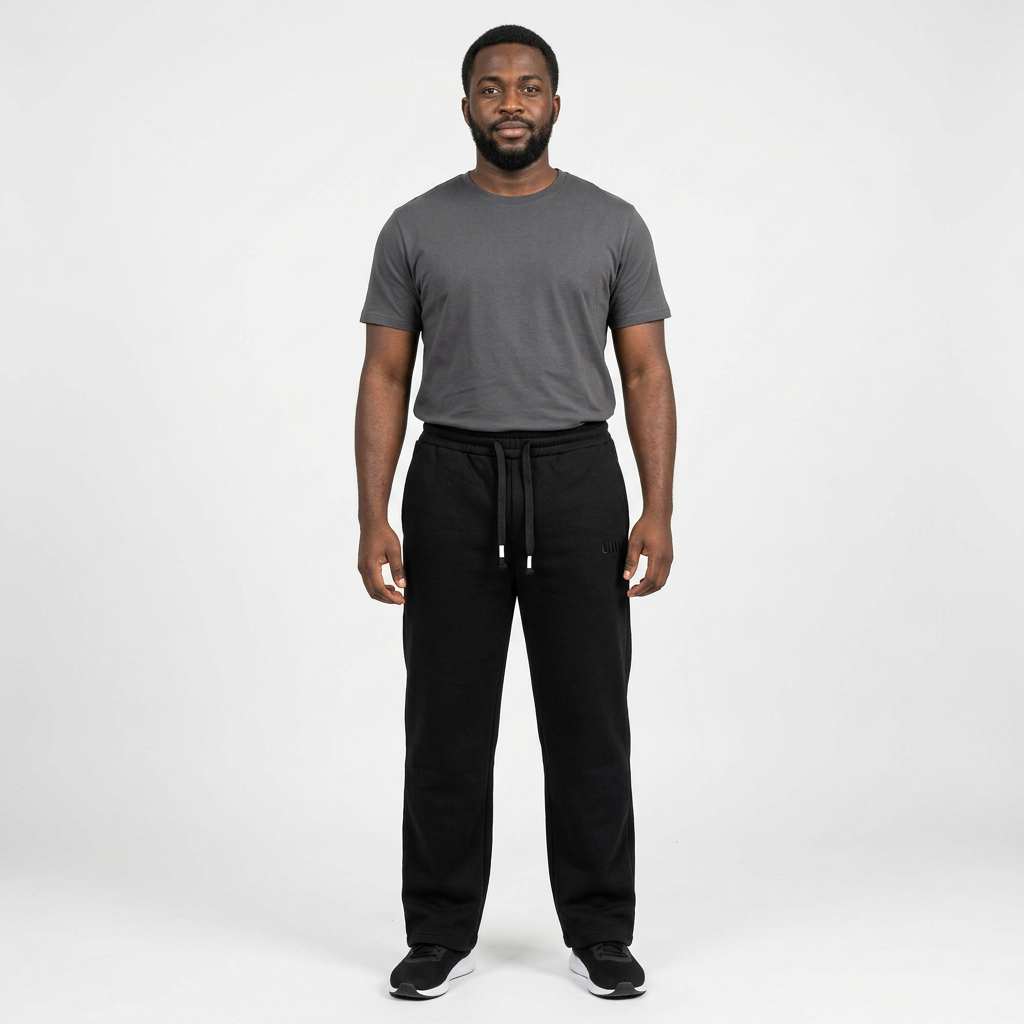 Adult Black male model wearing black tonal-detail drawstring joggers