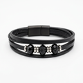 Black layered bracelet with faceted black beads and silver-tone spacers on white