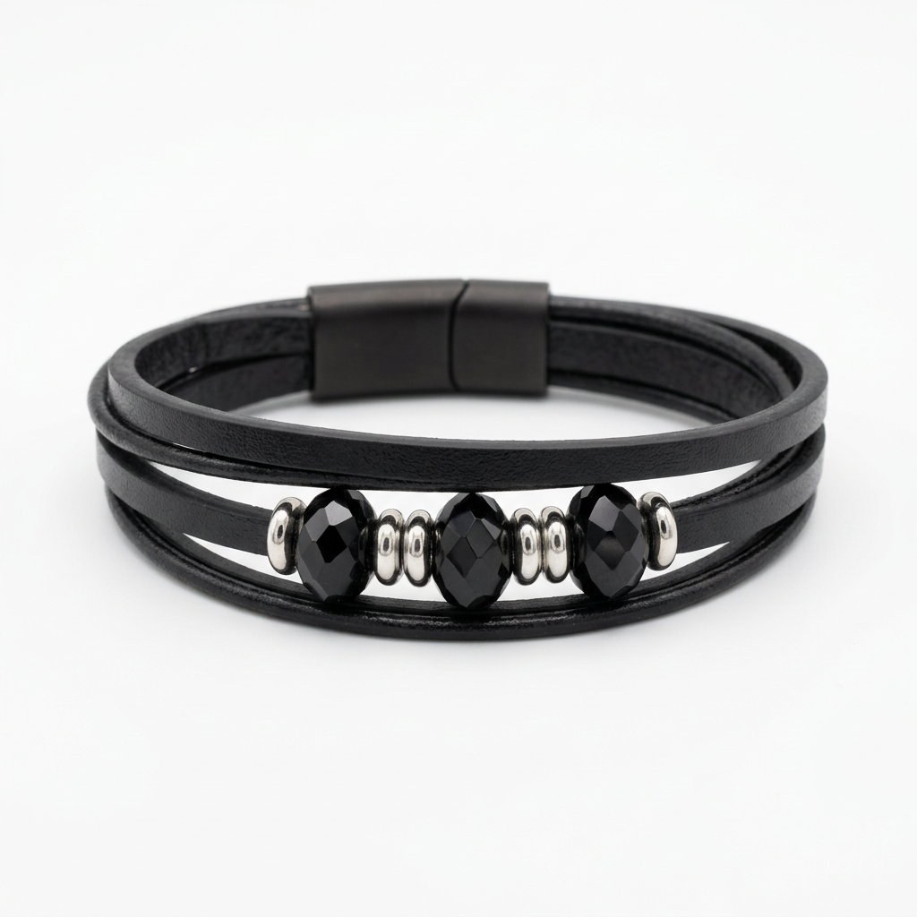 Black layered bracelet with faceted black beads and silver-tone spacers on white
