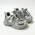 Matching metallic silver chunky lace-up trainers