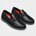 Black textured buckle loafer pair on a clean background