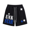 Black drawstring shorts with blue and white lettering and contrasting star graphics
