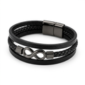 Black three-strand infinity bracelet with braided and flat bands on white