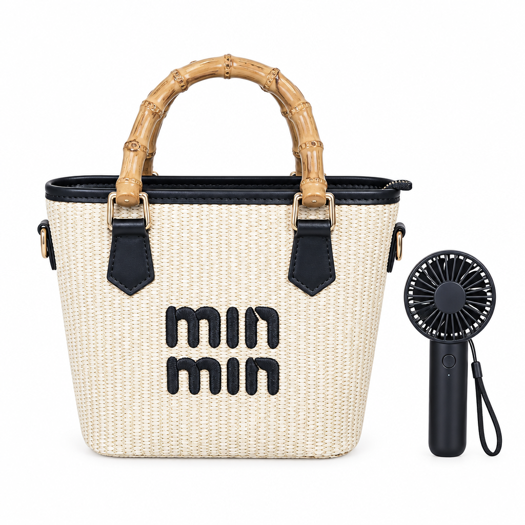 Cream handbag with black details and black mini fan on white background