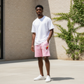 Young Nigerian male model wearing Pink Motivation Graphic Sweat Shorts