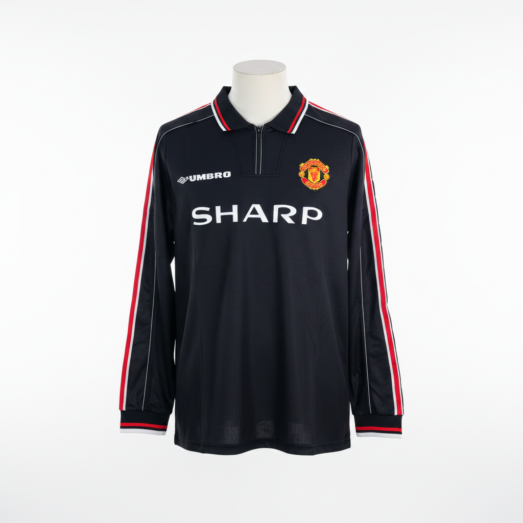 All-black long-sleeve football jersey with diamond tape sleeves and red and white trim, ghost mannequin front view