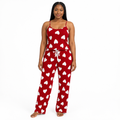 Adult model wearing red heart-print pajamas