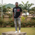 Men's Black Star-Stripe Graphic Polo Shirt – Nigerian Male Model Shot
