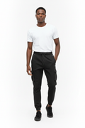 African male model wearing black cargo jogger pants with white t-shirt