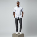 Nigerian male model wearing white and light blue fine pinstripe short-sleeved shirt
