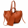 Cognac sculptural tote handbag with matching zip pouch on white