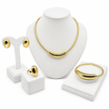 Gold crescent 4-piece jewelry set with necklace, bracelet, stud earrings and ring